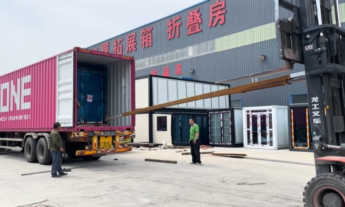 Shipping a Container House – Watch the Forklift in Action!