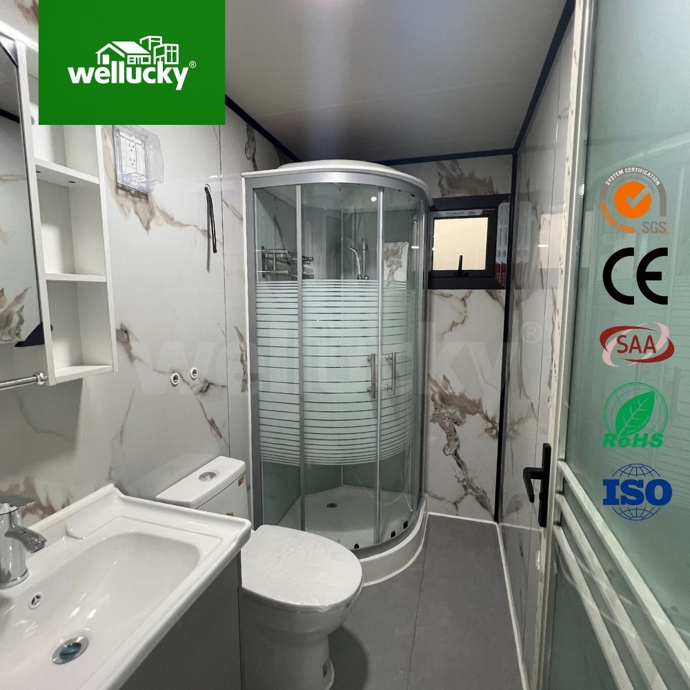 Expandable container house bathroom with shower and toilet